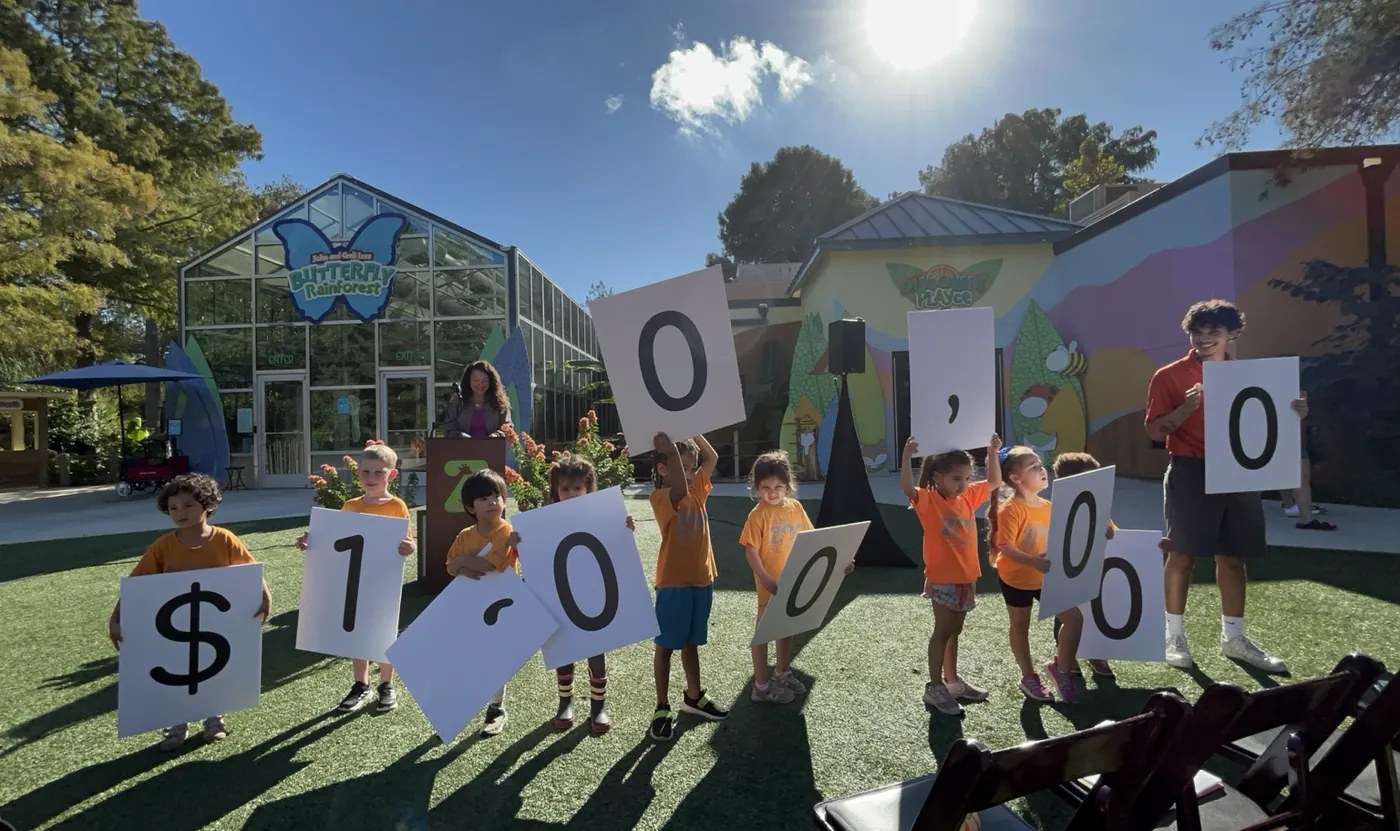 Fundraising event at San Antonio Zoo with a large check presentation